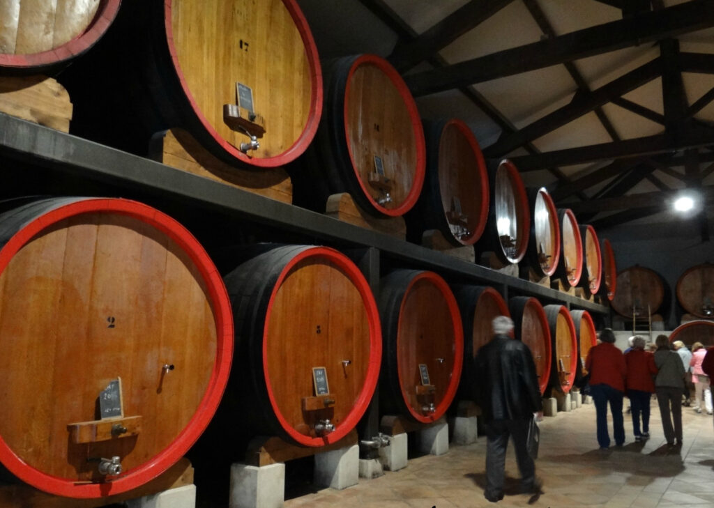 Large wine barrels at a winery in Chateuneuf du pape, France.