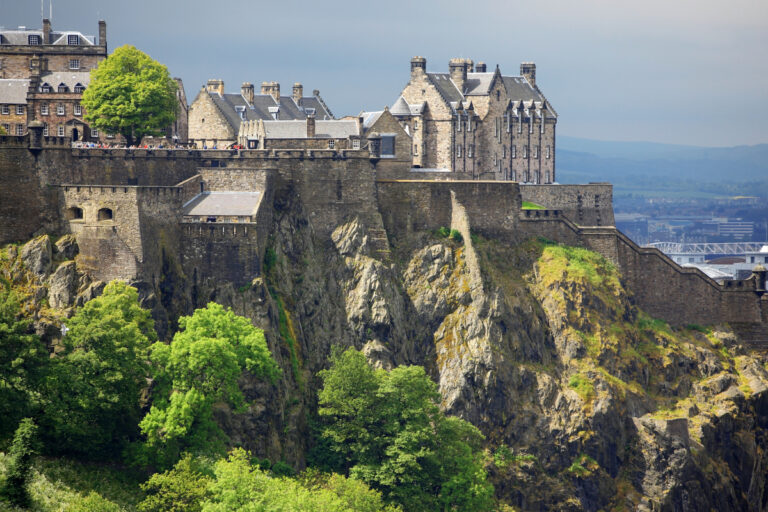 Edinburgh Castle on a hilltop as seen from a distance by konstantin 32