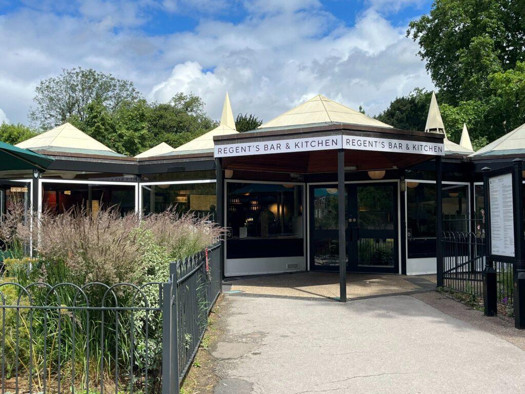 Exterior of Regent’s Bar & Kitchen surrounded by greenery in Regent’s Park, London